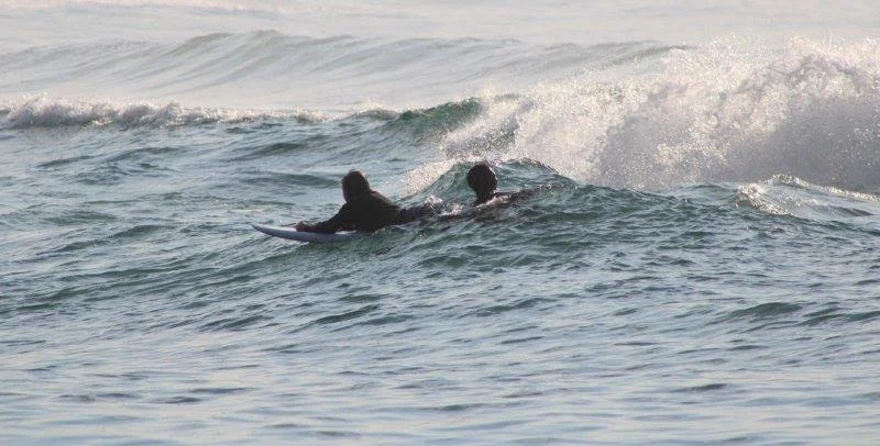 Adaptive surfing in the waves at Scottburgh Main Beach on the KZN South Coast