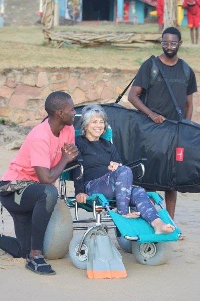 Sue Martin in the specialist beach wheelchair at Scottburgh Main Beach